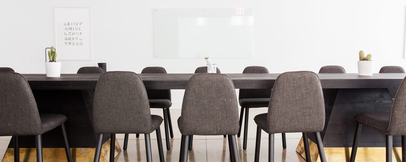A meeting room table and chairs