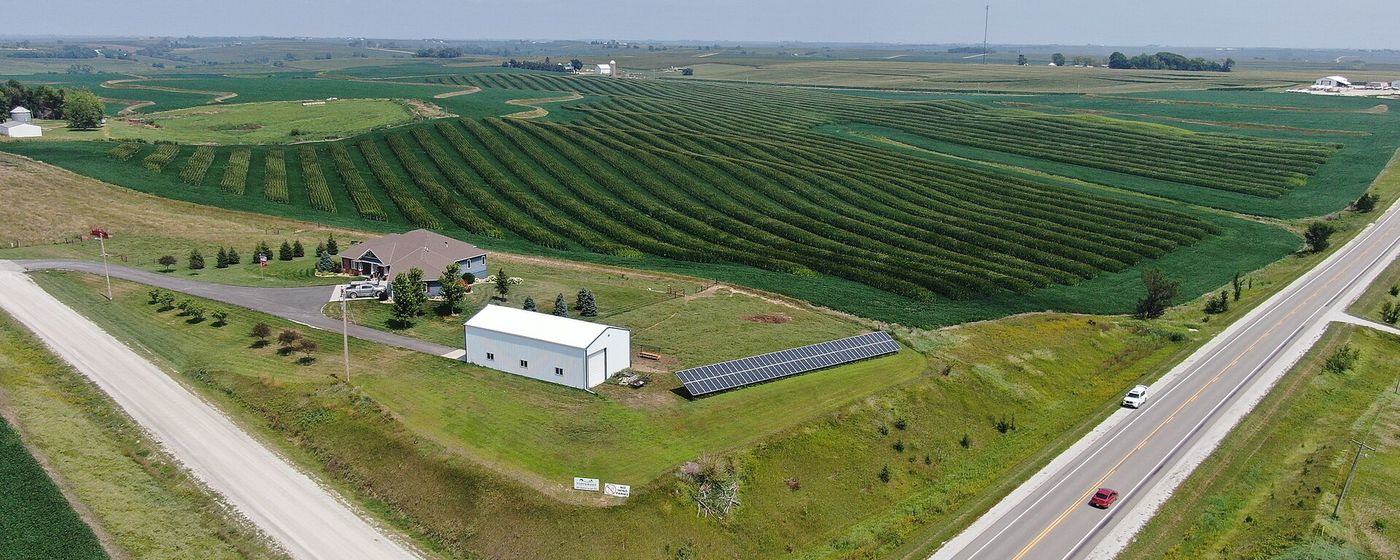 A solar farm set among green fields