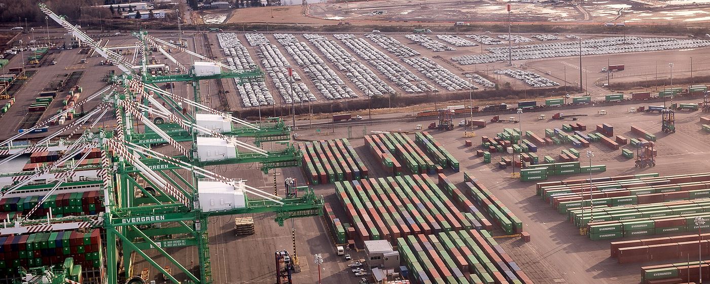 Aerial view of cranes and containers at a port