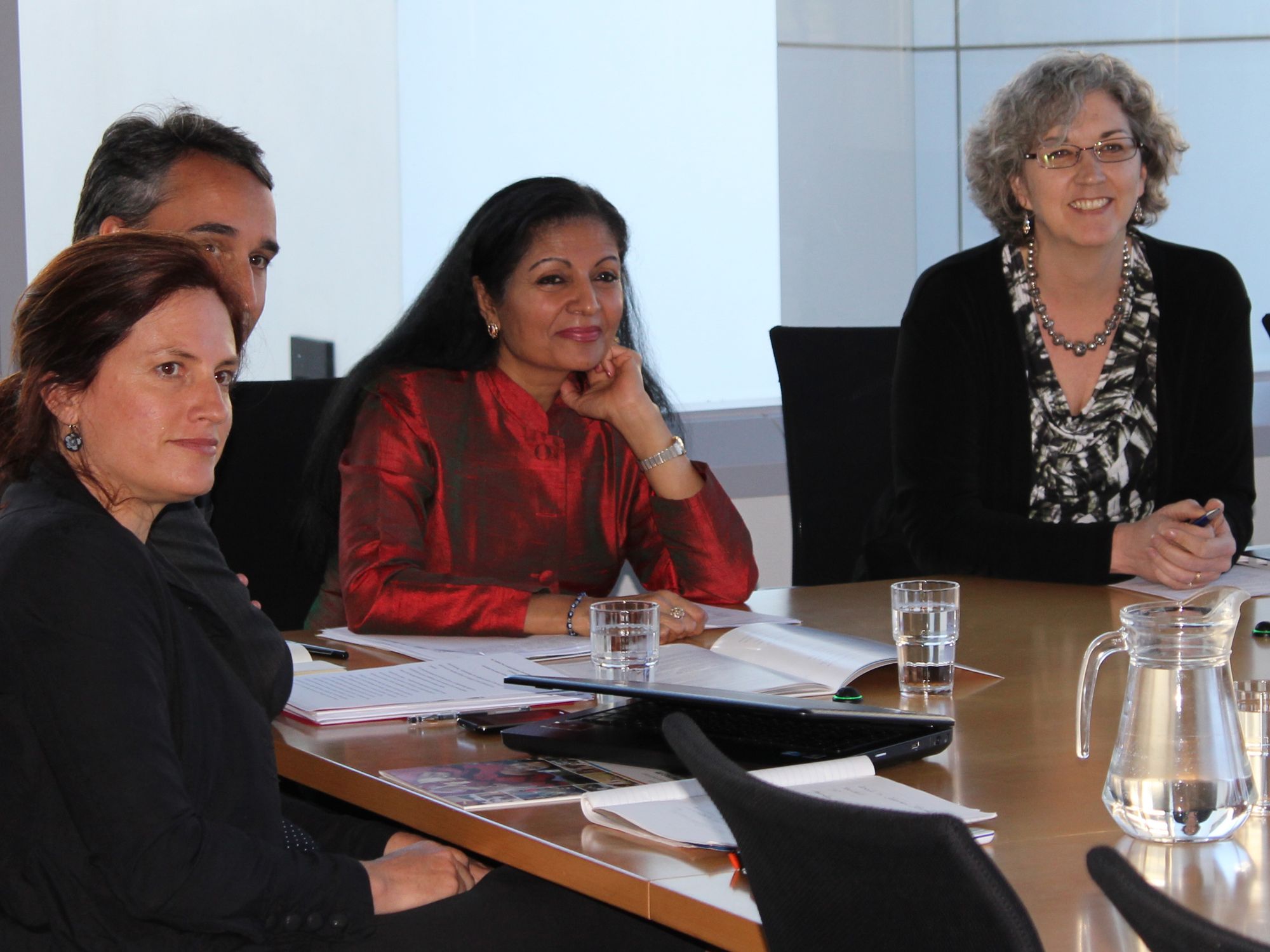 Three women in a meeting