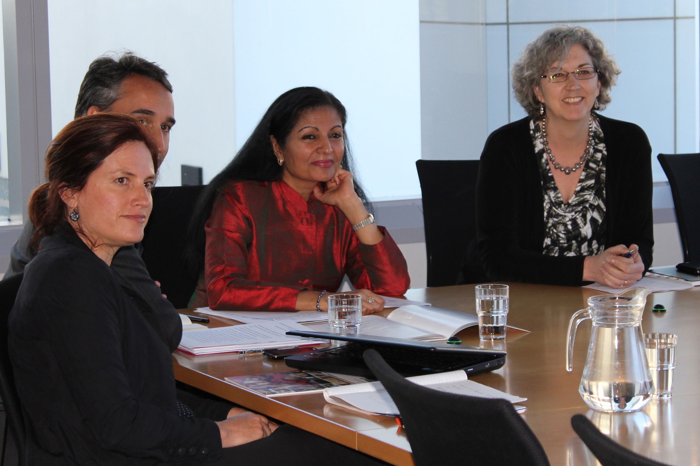 Three women in a meeting